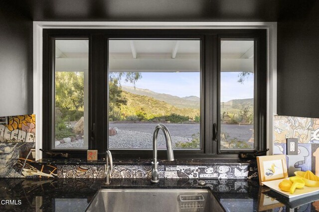 1417 Foothill Rd, Ojai, CA 93023 - kitchen view of a sink and dark stone countertops