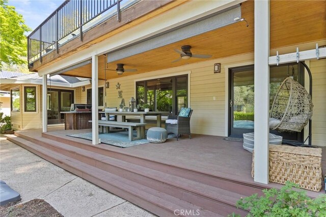 15 Quadra Ct, Chico, CA 95928 - wooden deck with ceiling fan and outdoor dining area