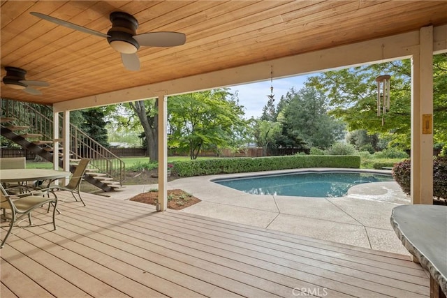 15 Quadra Ct, Chico, CA 95928 - outdoor pool featuring stairs, a ceiling fan, a deck, outdoor dining area, and a fenced backyard