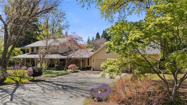 15 Quadra Ct, Chico, CA 95928 - view of front of property featuring asphalt driveway and a garage