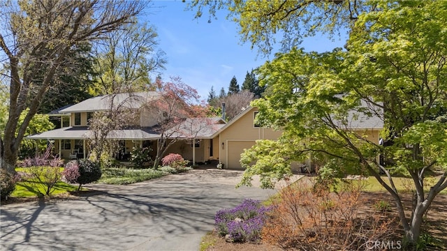 15 Quadra Ct, Chico, CA 95928 - view of front of property featuring a garage and asphalt driveway