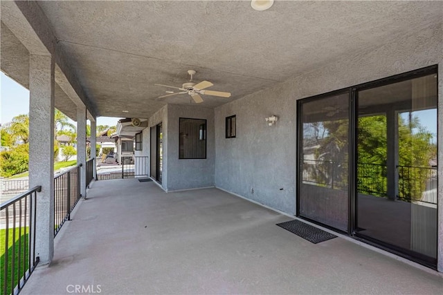 view of patio / terrace featuring ceiling fan