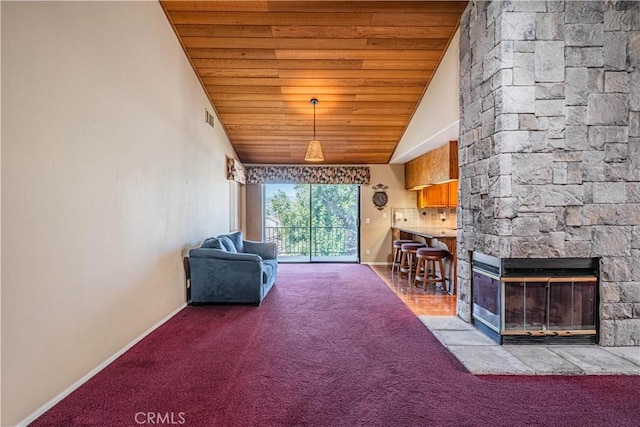 unfurnished living room with high vaulted ceiling, carpet, visible vents, wooden ceiling, and baseboards
