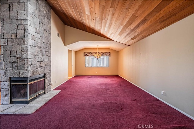 bonus room with an inviting chandelier, a stone fireplace, wood ceiling, vaulted ceiling, and carpet flooring