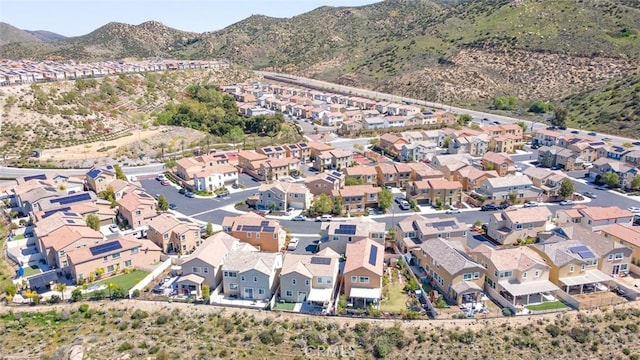 aerial view featuring a mountain view and a residential view