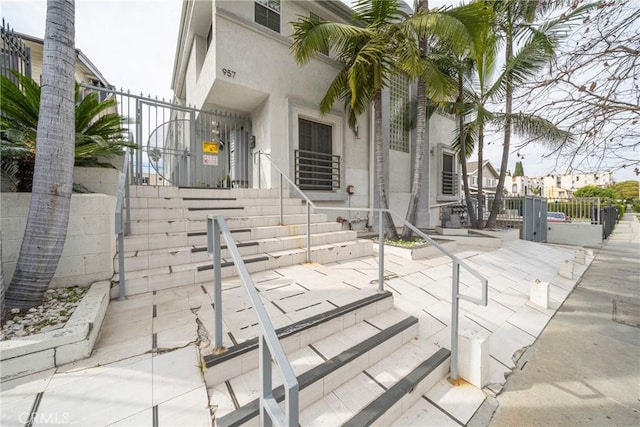 exterior space featuring fence and a gate