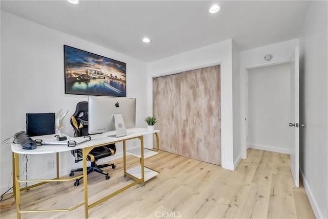 office area featuring wood finished floors, baseboards, and recessed lighting