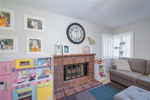 carpeted living room with a brick fireplace