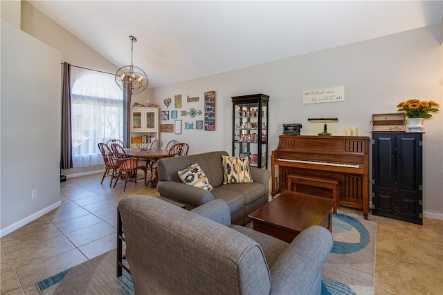 living area with baseboards, light tile patterned floors, a notable chandelier, and lofted ceiling