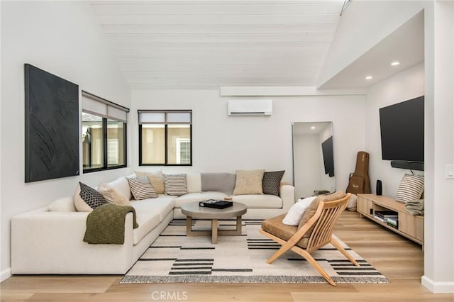 7171/2 Orchid Ave, Corona Del Mar, CA 92625 - living room featuring baseboards, light wood-type flooring, vaulted ceiling, a wall mounted air conditioner, and recessed lighting