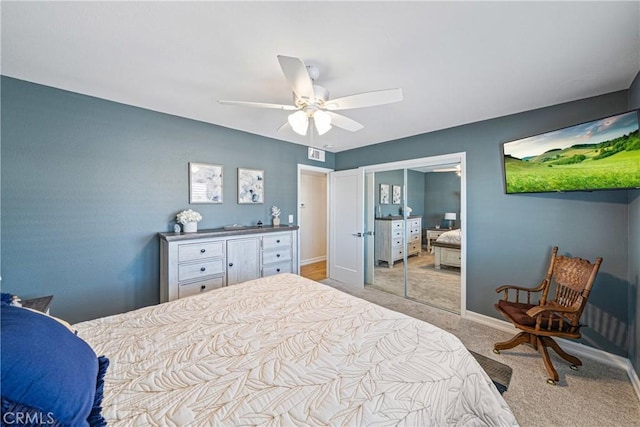 29251 Pebble Beach Dr, Menifee, CA 92586 - bedroom with a closet, ceiling fan, light colored carpet, baseboards, and visible vents