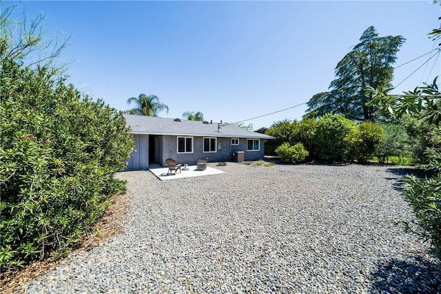 29251 Pebble Beach Dr, Menifee, CA 92586 - rear view of property featuring a patio and stucco siding