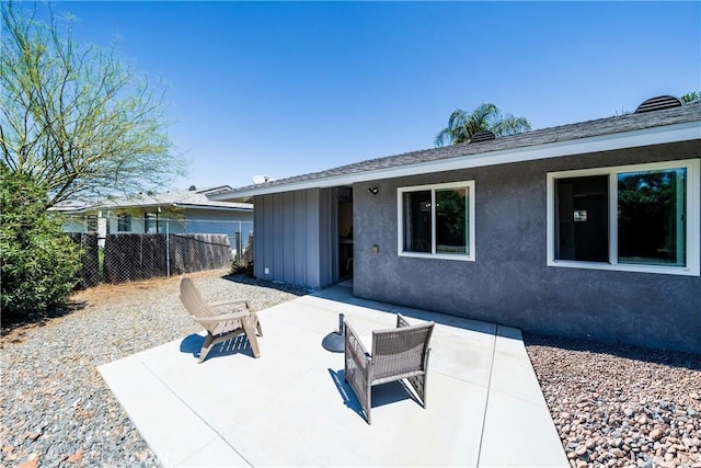 29251 Pebble Beach Dr, Menifee, CA 92586 - back of property featuring stucco siding, fence, and a patio