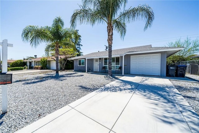 29251 Pebble Beach Dr, Menifee, CA 92586 - single story home with fence, driveway, covered porch, and a garage