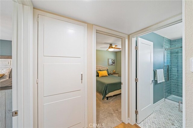 29251 Pebble Beach Dr, Menifee, CA 92586 - full bathroom with connected bathroom, a shower stall, and ceiling fan