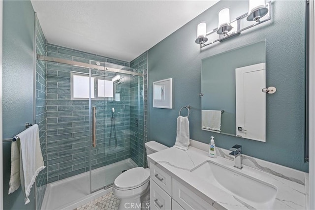 29251 Pebble Beach Dr, Menifee, CA 92586 - full bathroom with a shower stall, toilet, vanity, and tile patterned floors