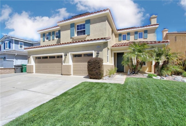 mediterranean / spanish home featuring concrete driveway, stucco siding, an attached garage, a front lawn, and a tiled roof