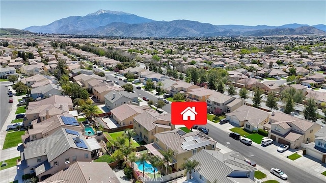 drone / aerial view with a residential view and a mountain view