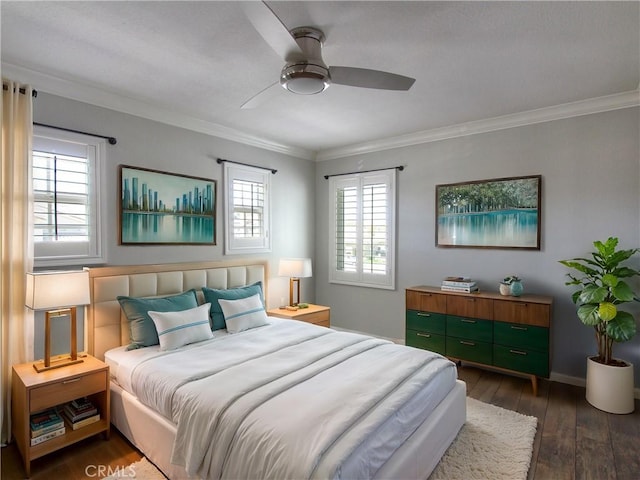 bedroom featuring ceiling fan, baseboards, ornamental molding, and dark wood finished floors
