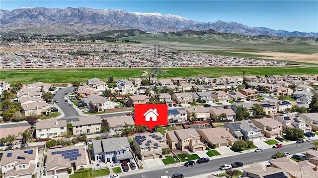 drone / aerial view with a mountain view and a residential view