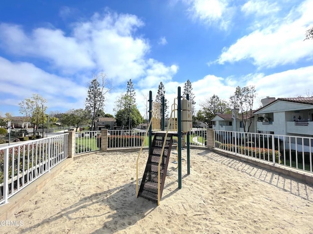 community jungle gym with fence