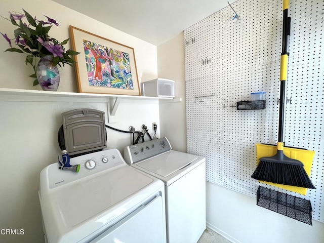 laundry room featuring laundry area and washer and clothes dryer