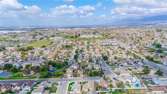 bird's eye view with a residential view and a mountain view