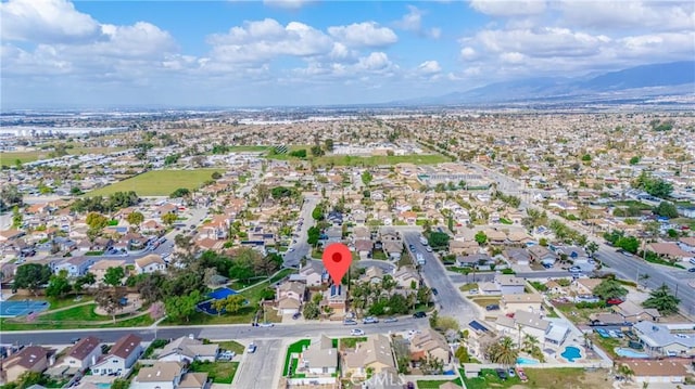 aerial view with a mountain view and a residential view