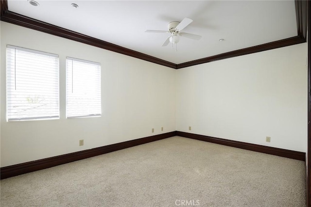33762 Orilla Rd, Dana Point, CA 92629 - empty room featuring crown molding, light carpet, baseboards, and a ceiling fan