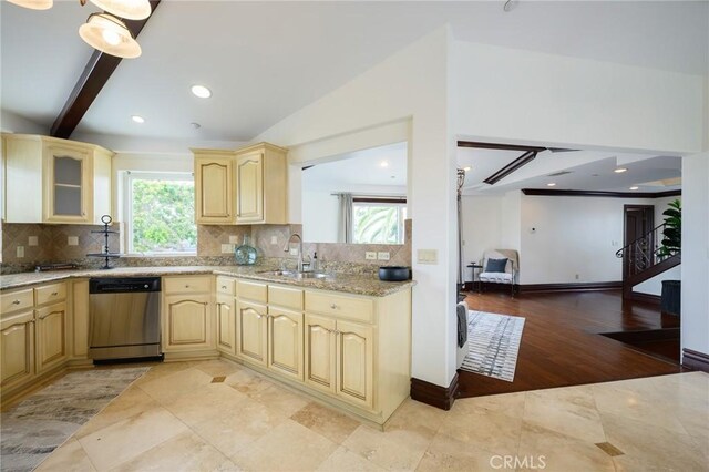 33762 Orilla Rd, Dana Point, CA 92629 - kitchen with dishwasher, a sink, decorative backsplash, light stone countertops, and glass insert cabinets