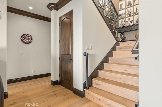121 Avenida Pizarro, San Clemente, CA 92672 - staircase with crown molding, baseboards, wood finished floors, and recessed lighting