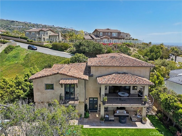 121 Avenida Pizarro, San Clemente, CA 92672 - back of house with a patio area, a lawn, stairs, and stucco siding