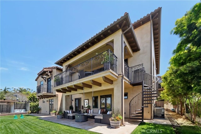 121 Avenida Pizarro, San Clemente, CA 92672 - rear view of house featuring an outdoor living space, stairway, a patio area, a balcony, and stucco siding