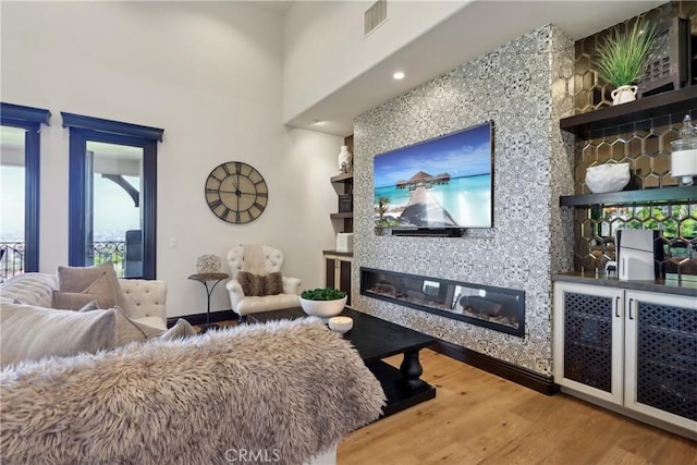 121 Avenida Pizarro, San Clemente, CA 92672 - living room with wood finished floors, a glass covered fireplace, and baseboards