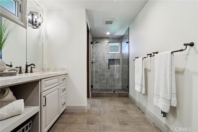121 Avenida Pizarro, San Clemente, CA 92672 - full bath with baseboards, a tile shower, vanity, and tile patterned floors