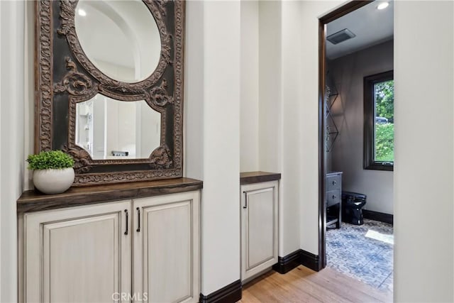 121 Avenida Pizarro, San Clemente, CA 92672 - corridor with baseboards and light wood-style floors
