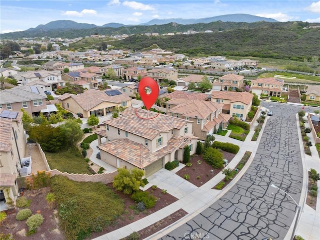 bird's eye view featuring a residential view and a mountain view