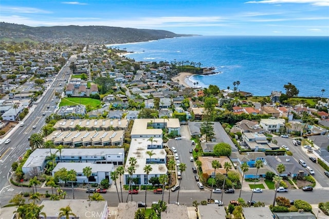 aerial perspective of suburban area with a water and mountain view