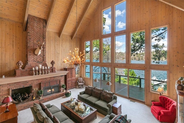 27990 Peninsula Dr N, Lake Arrowhead, CA 92352 - living area with wood walls, high vaulted ceiling, carpet floors, and beamed ceiling