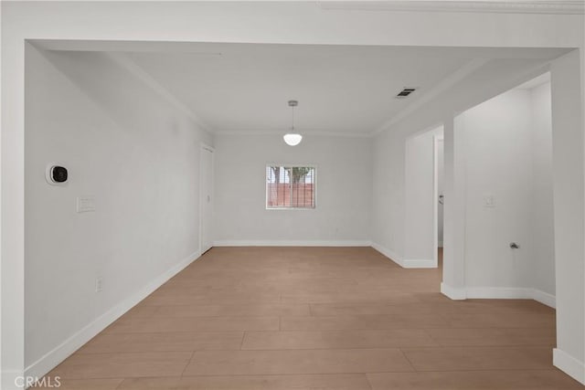 5025 Noble Ave, Sherman Oaks, CA 91403 - spare room featuring light wood-type flooring, crown molding, and baseboards