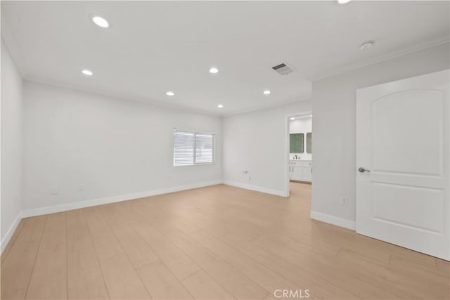 5025 Noble Ave, Sherman Oaks, CA 91403 - unfurnished room featuring baseboards, recessed lighting, crown molding, and light wood finished floors