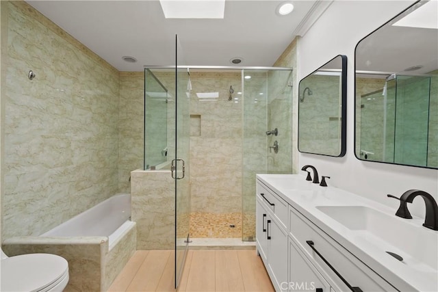 5025 Noble Ave, Sherman Oaks, CA 91403 - full bath featuring a garden tub, a stall shower, double vanity, and toilet