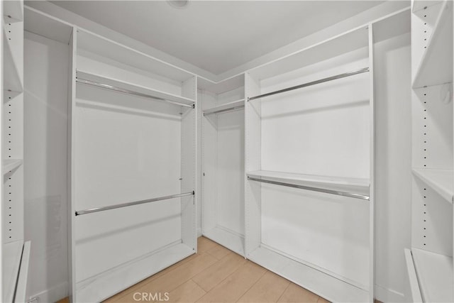 5025 Noble Ave, Sherman Oaks, CA 91403 - spacious closet with light wood finished floors