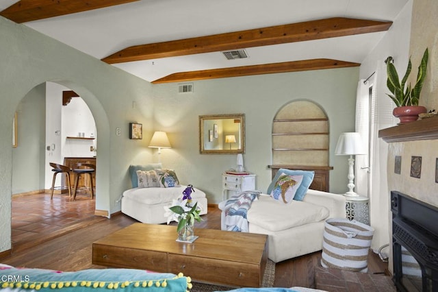 308 Topa Topa Dr, Ojai, CA 93023 - living area with visible vents, vaulted ceiling with beams, arched walkways, and wood finished floors