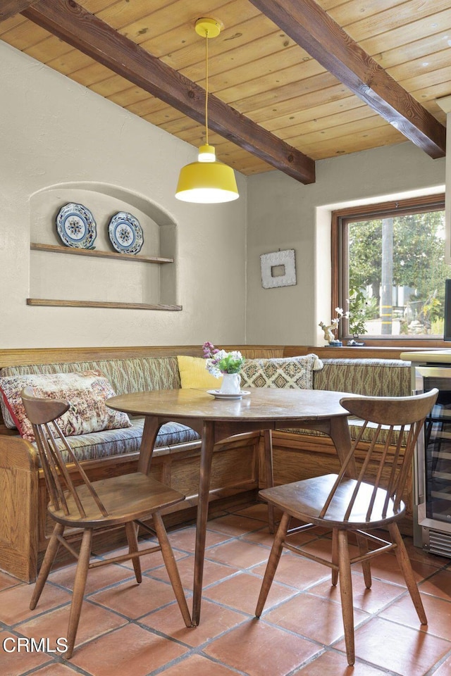 308 Topa Topa Dr, Ojai, CA 93023 - dining room featuring wine cooler, beamed ceiling, wooden ceiling, and breakfast area