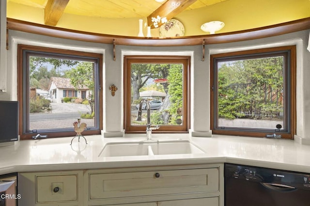 308 Topa Topa Dr, Ojai, CA 93023 - kitchen featuring light countertops, black dishwasher, beamed ceiling, and a sink