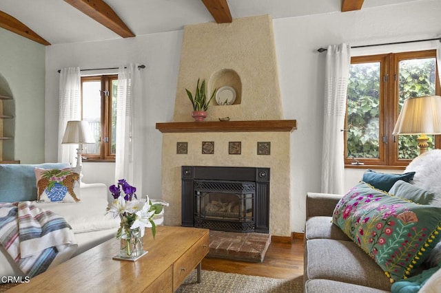 308 Topa Topa Dr, Ojai, CA 93023 - living area with beamed ceiling, wood finished floors, and a tiled fireplace