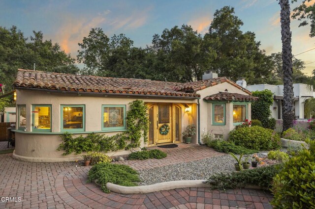 308 Topa Topa Dr, Ojai, CA 93023 - mediterranean / spanish house with a tiled roof, stucco siding, and a chimney