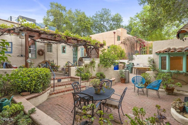 308 Topa Topa Dr, Ojai, CA 93023 - view of patio featuring a pergola and outdoor dining area