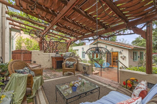 308 Topa Topa Dr, Ojai, CA 93023 - view of patio with outdoor lounge area, a pergola, and a gate